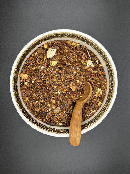 Rooibostee, lose, Zimt, Orange, Weinbeeren